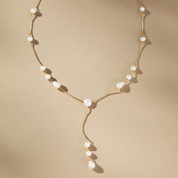 Anthropologie Jewelry - ANTHROPOLOGIE Spaced Pearl Y-Neck Necklace - Ivory NWT